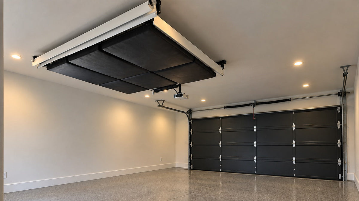 A garage with the retractable golf simulator screens rolled up into the ceiling
