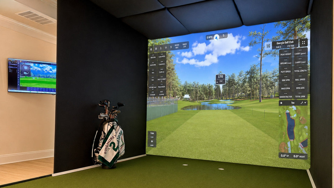 Retractable golf simulator screens deployed in a room with a standard ceiling