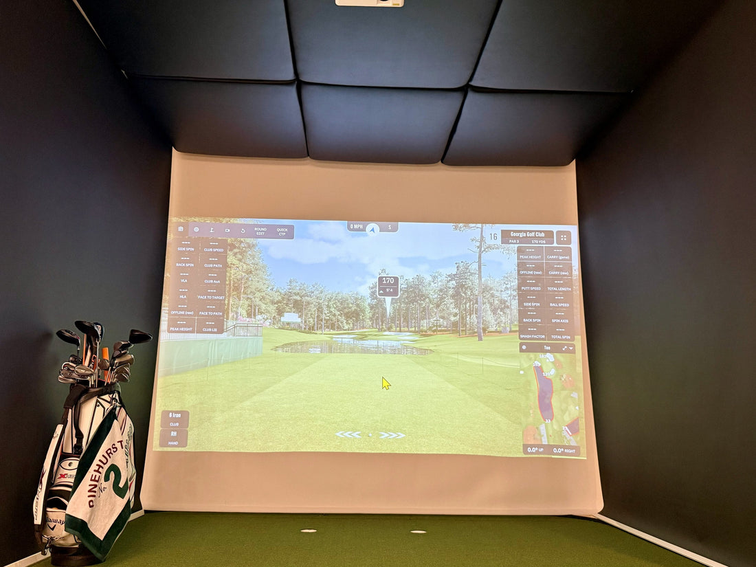 The Home Fairway retractable golf simulator bay deployed in a home
