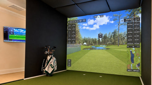 The Home Fairway hitting bay deployed, 3-ply impact screen and side screens with the simulator running