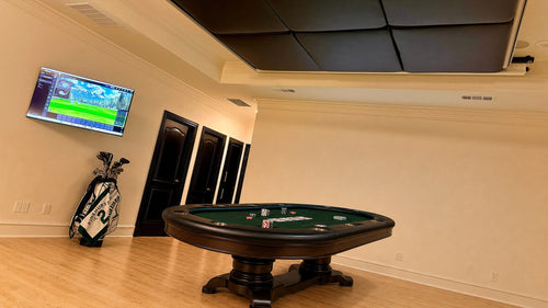 Same room with the screens retracted, poker table back in play