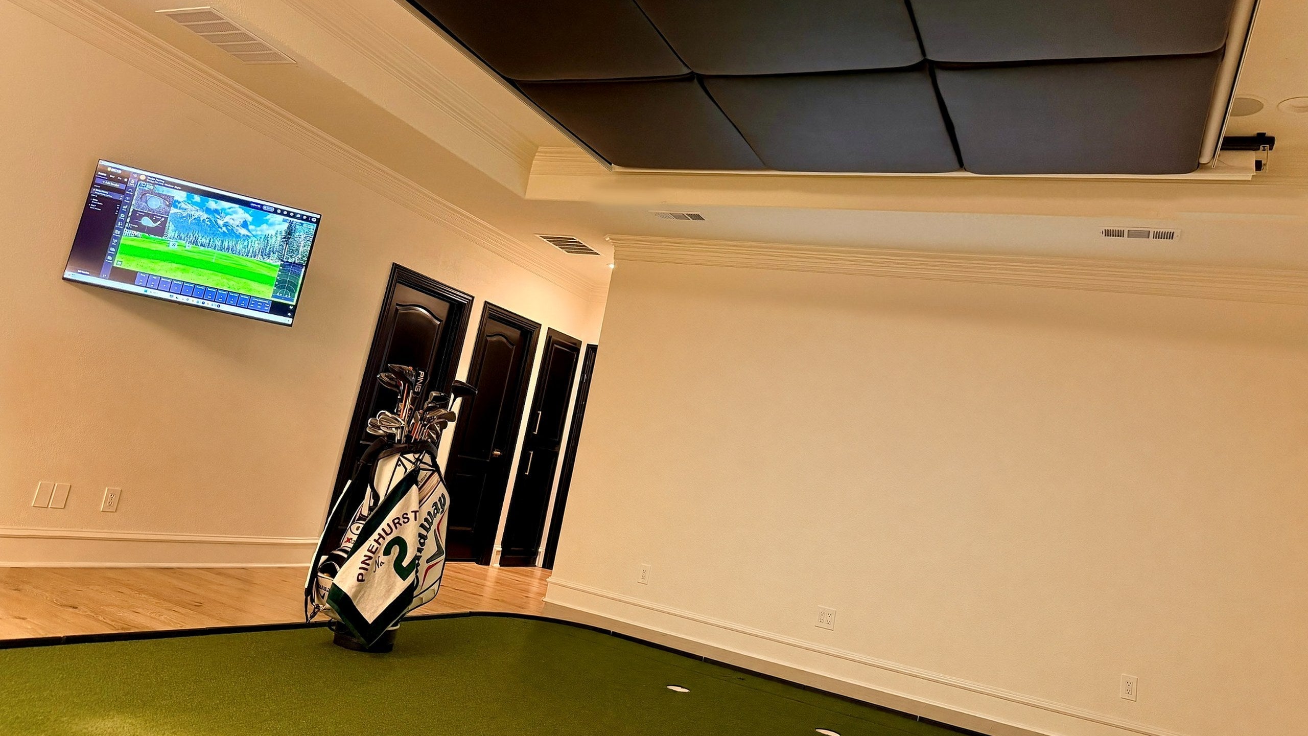 Screens fully retracted into the ceiling, room wide open